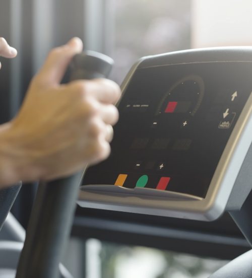 adult-man-making-cardio-training-exercises-gym-club